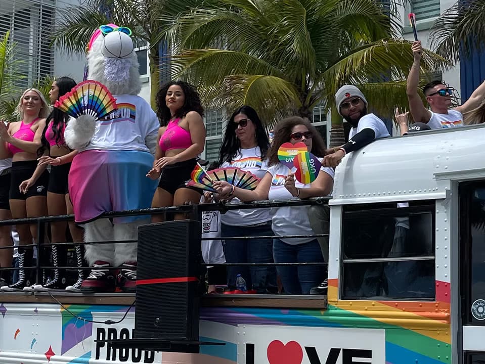 Rumbatours open-air party bus at Miami Beach Pride Festival with Miami Heat dancers