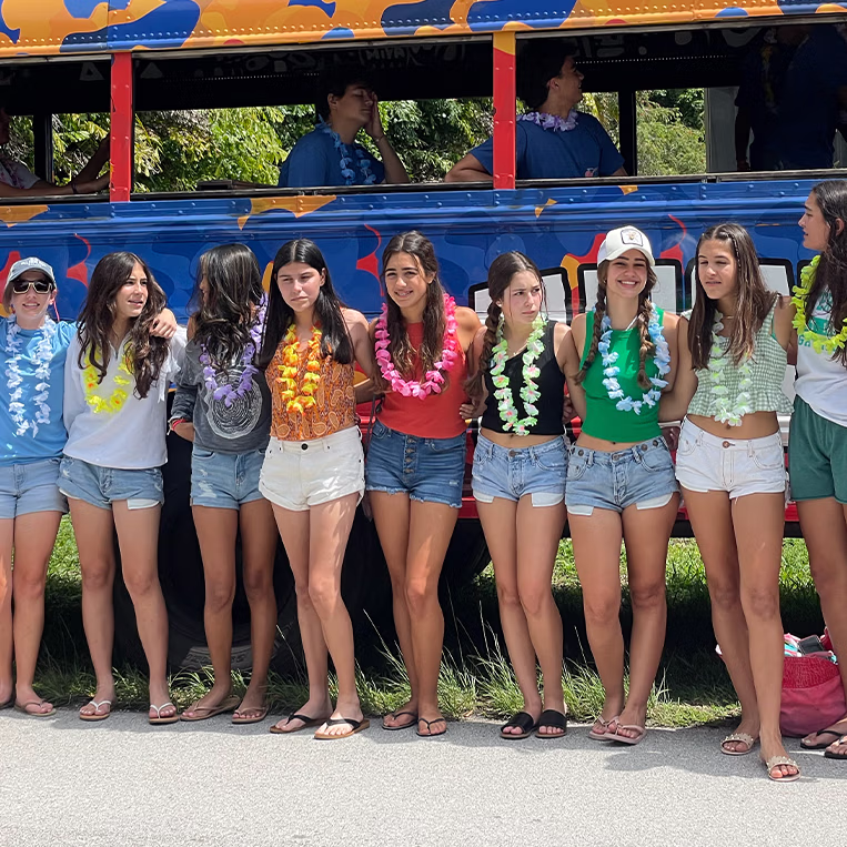 Teens celebrating on Miami party bus