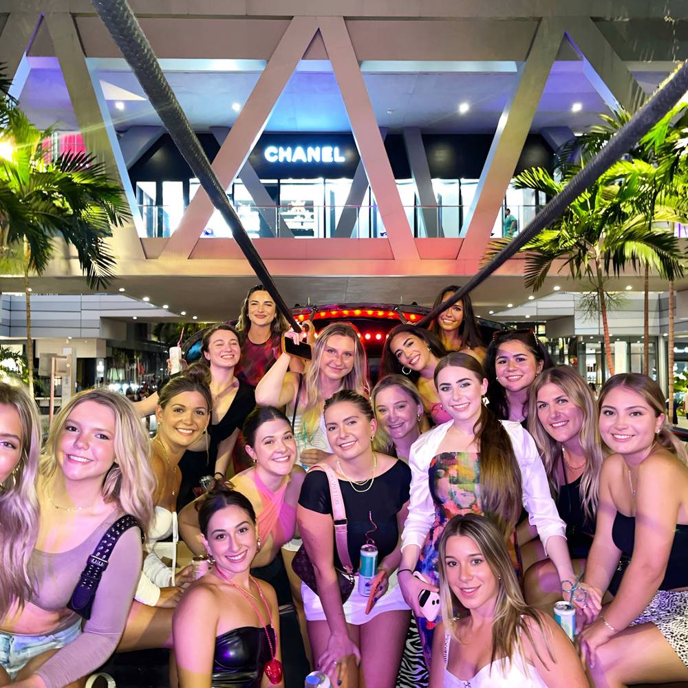 Orlando party bus group photo at night